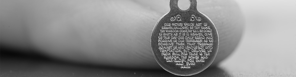 Lords-Prayer-disc-next-to-a-finger Lords-Prayer-disc-next-to-a-finger